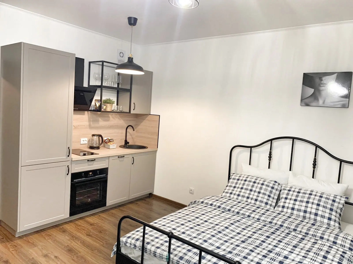 Квартира Loft Studio on Komendantskiy