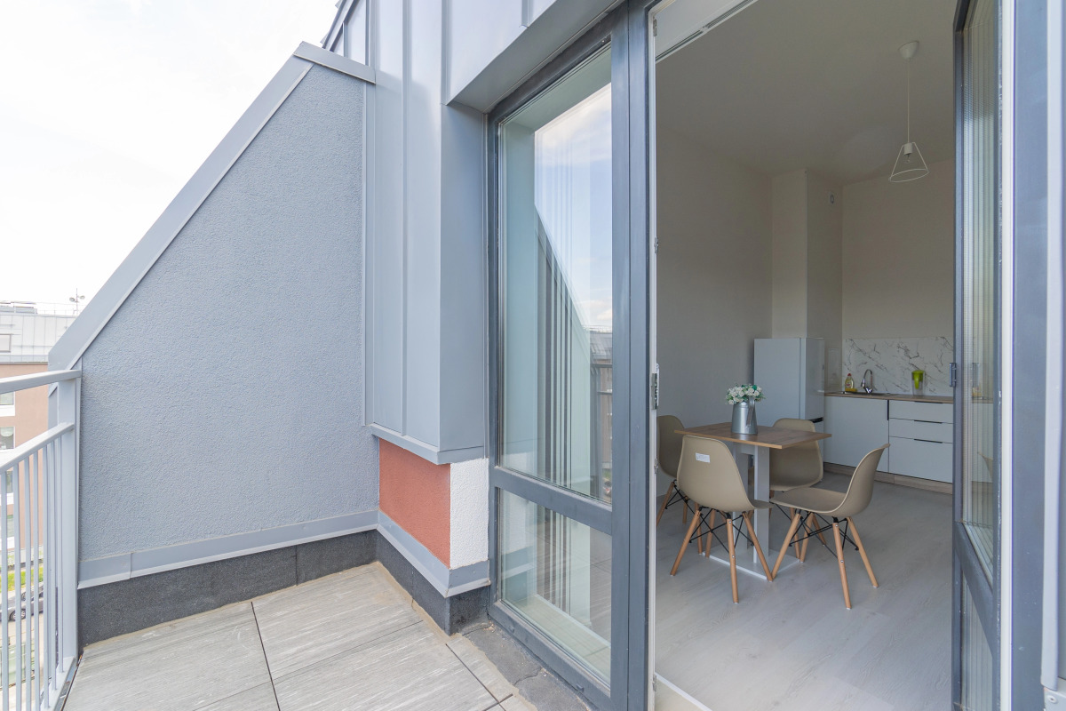 Апартаменты Двухкомнатная Квартира на Мансардном Этаже