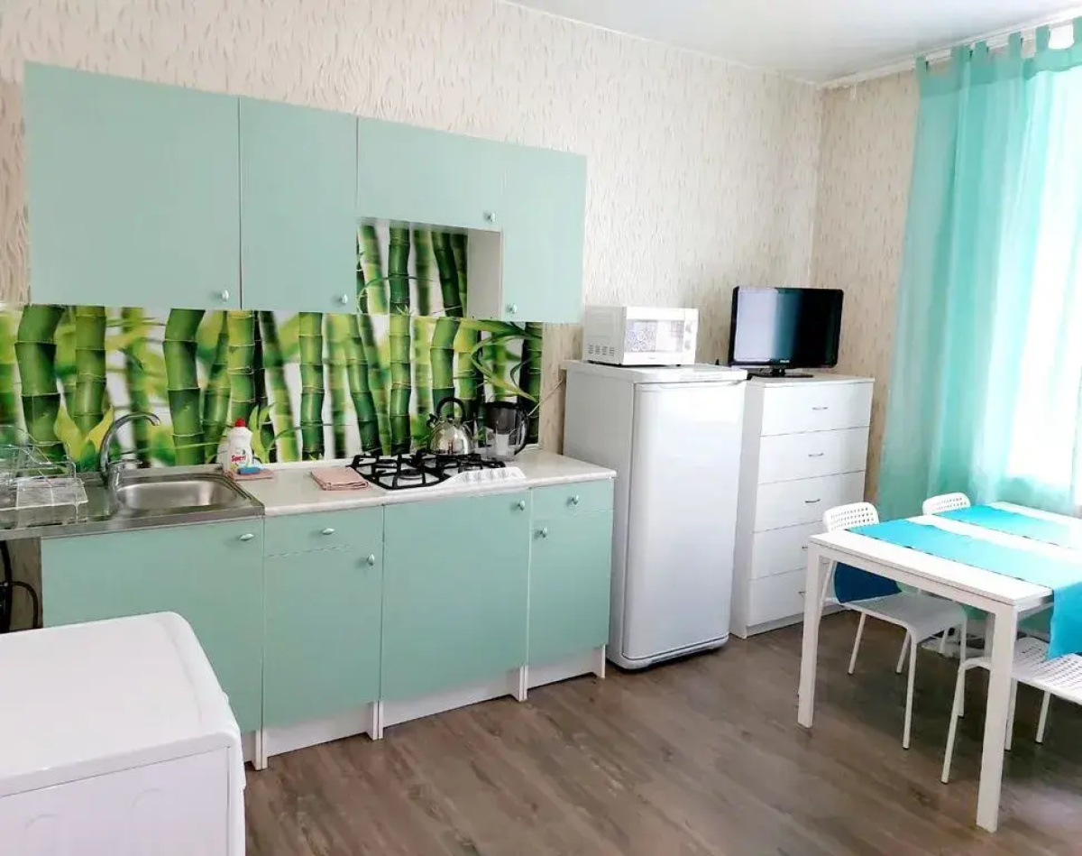 Квартира у Часовой Башни с Просторной Кухней