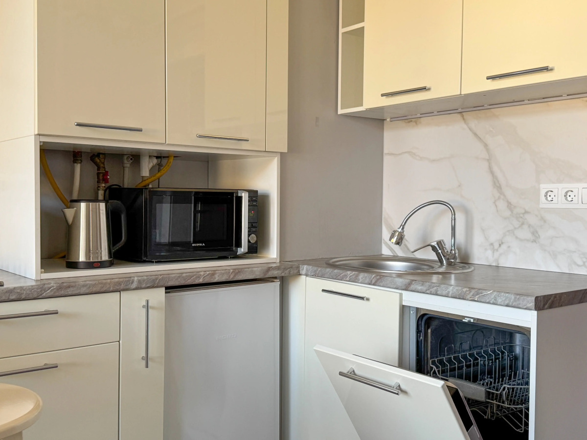 Апартаменты с балконом у реки рядом с пляжем