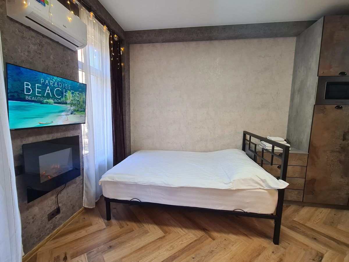 Апартаменты Квартира с Камином