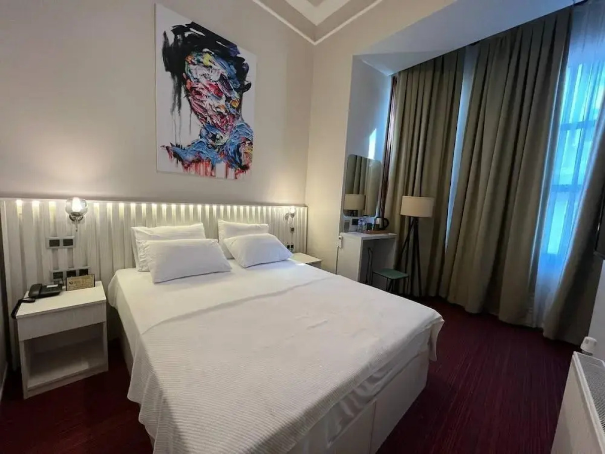 Отель Rafinn Hotel