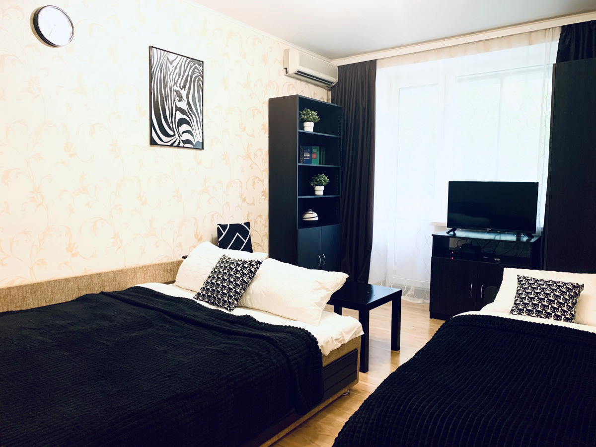 Апартаменты Комфортная Уютная 2-Комнатная Квартира в Центре с Парковкой