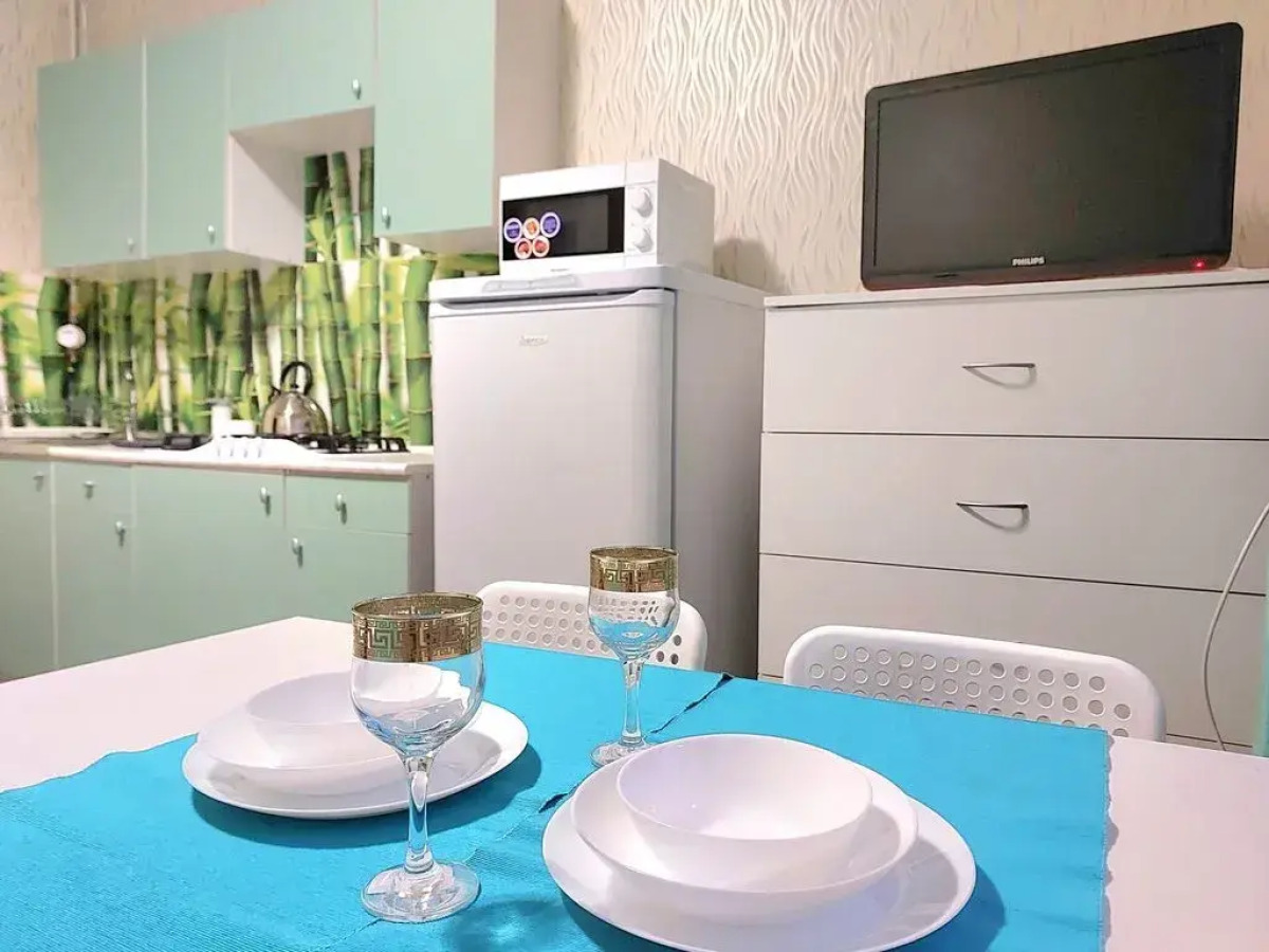 Квартира у Часовой Башни с Просторной Кухней