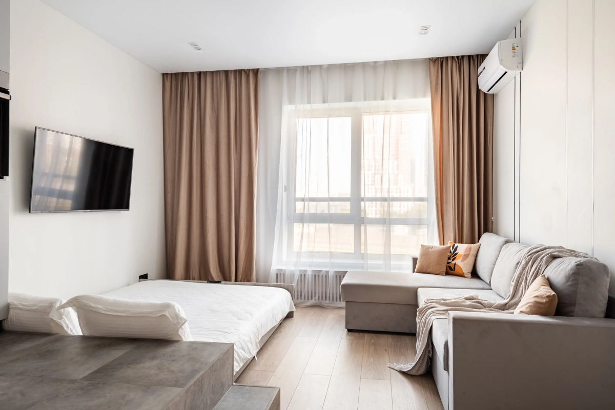 Квартира С Подиумом и выдвижной кроватью дизайнерская