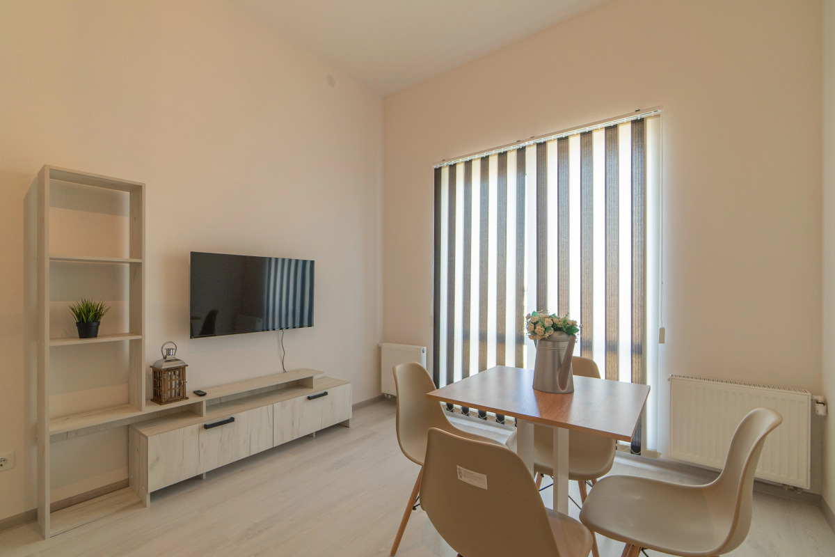 Апартаменты Двухкомнатная Квартира на Мансардном Этаже