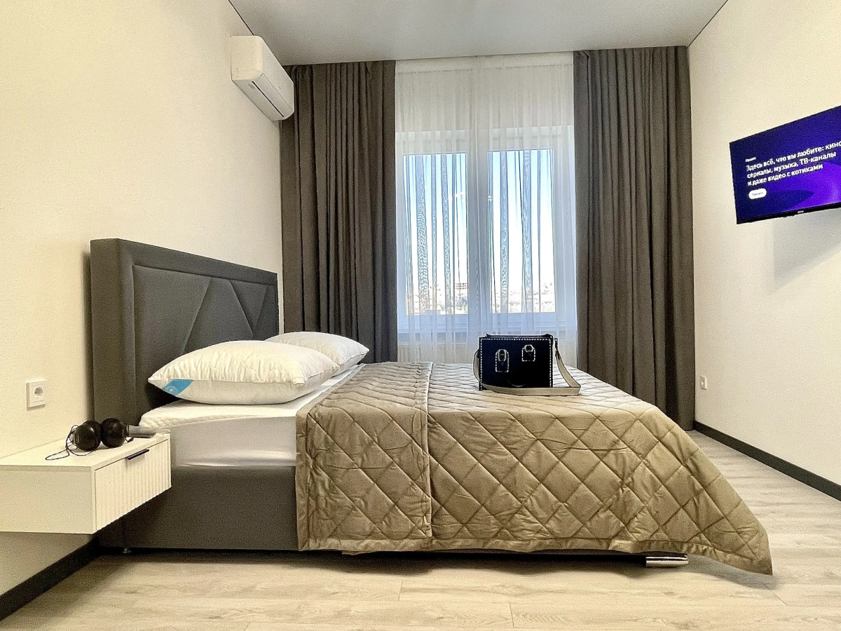 Квартира Двухкомнатный Лофт с Панорамным Видом на Город и Парк