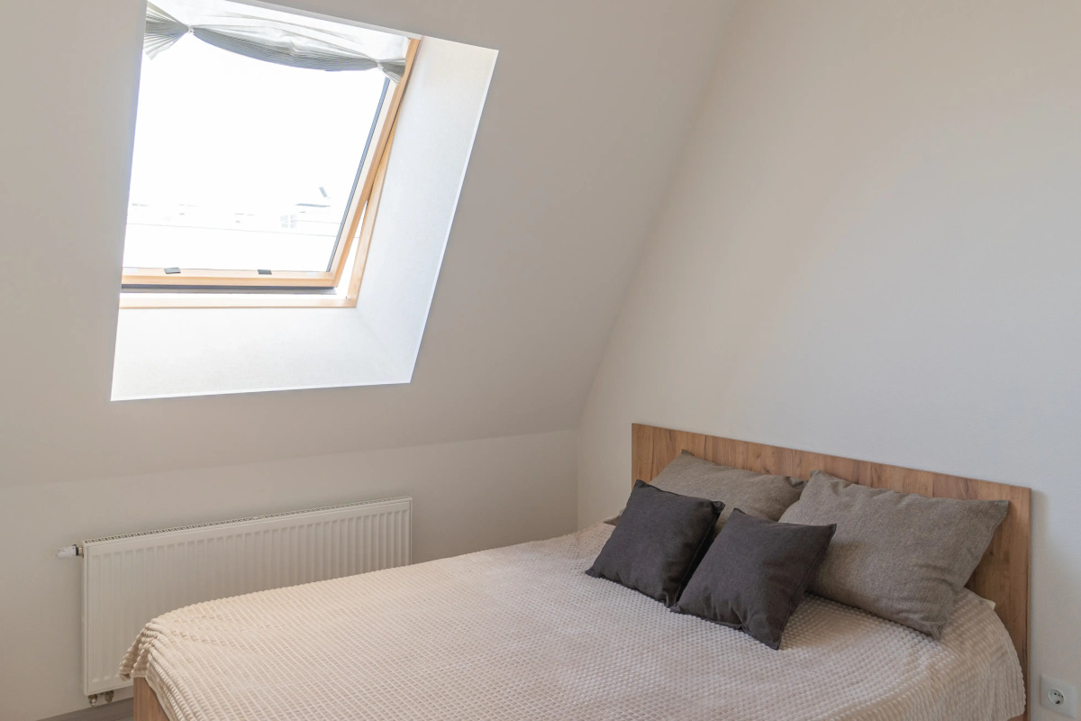 Апартаменты Двухкомнатная Квартира на Мансардном Этаже