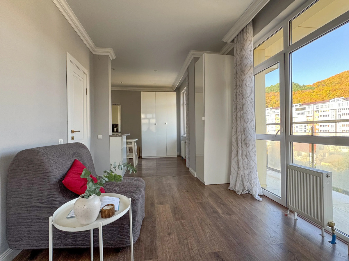 Апартаменты с балконом у реки рядом с пляжем