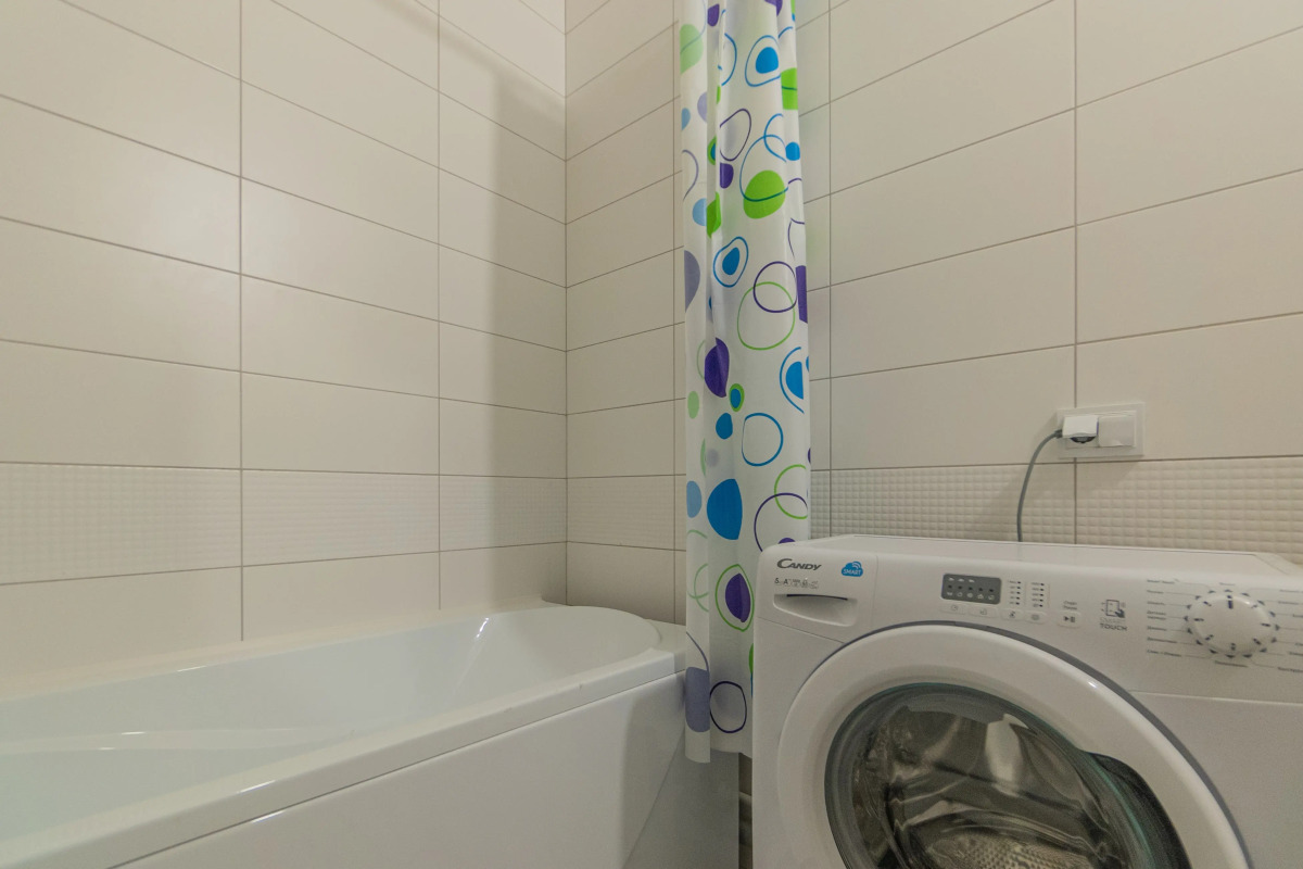 Апартаменты Двухкомнатная Квартира на Мансардном Этаже