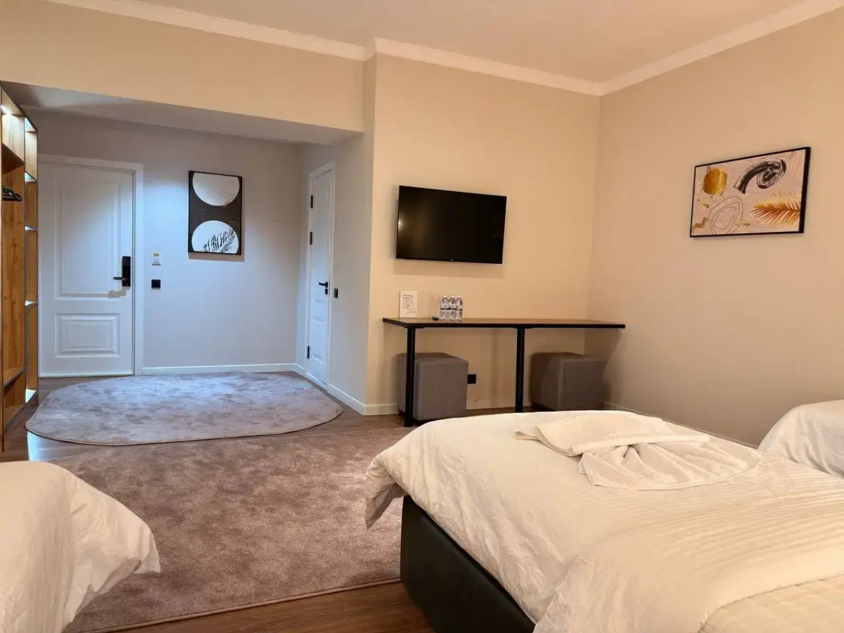 Отель Status Inn