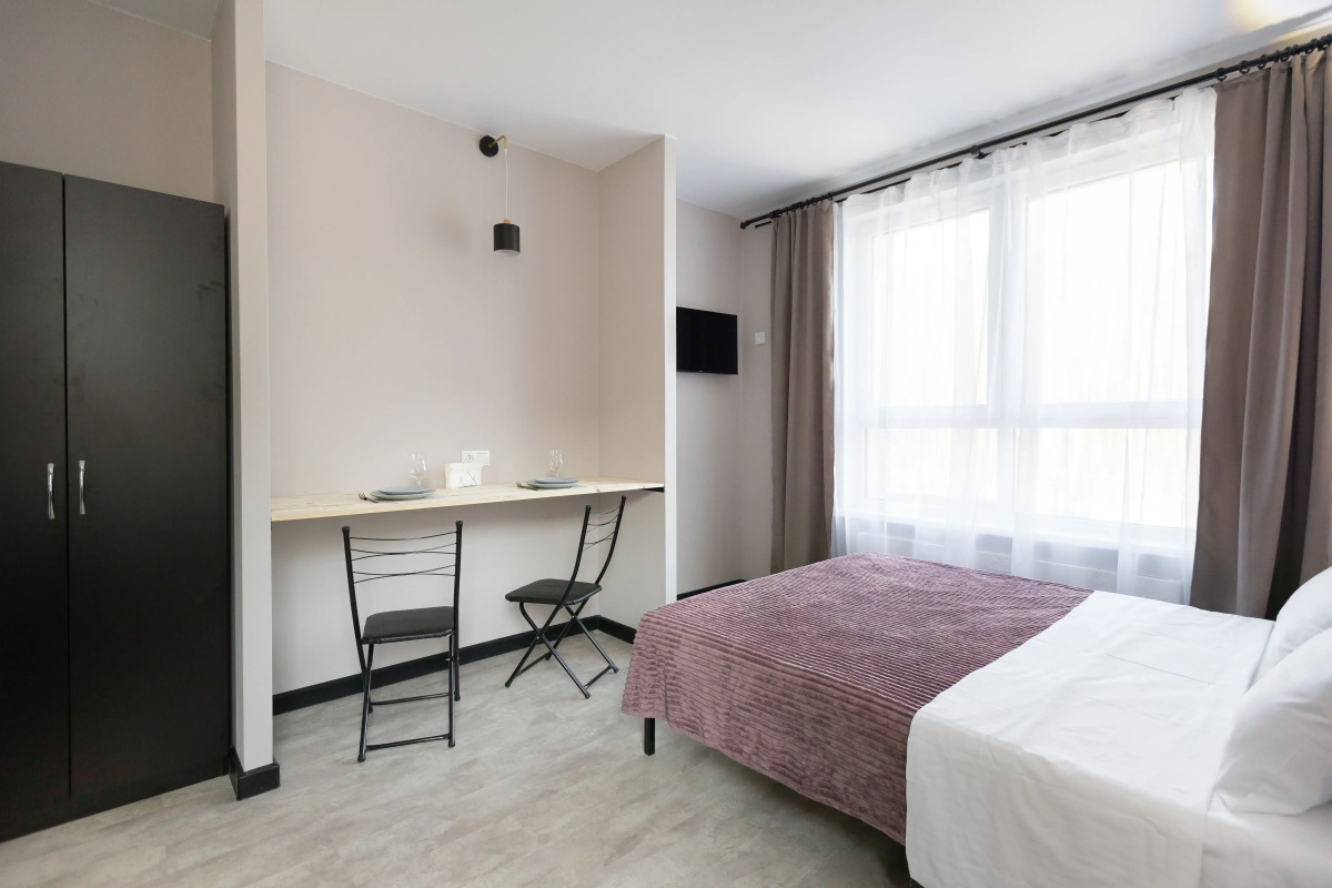 Апартаменты Студия на П. Романова