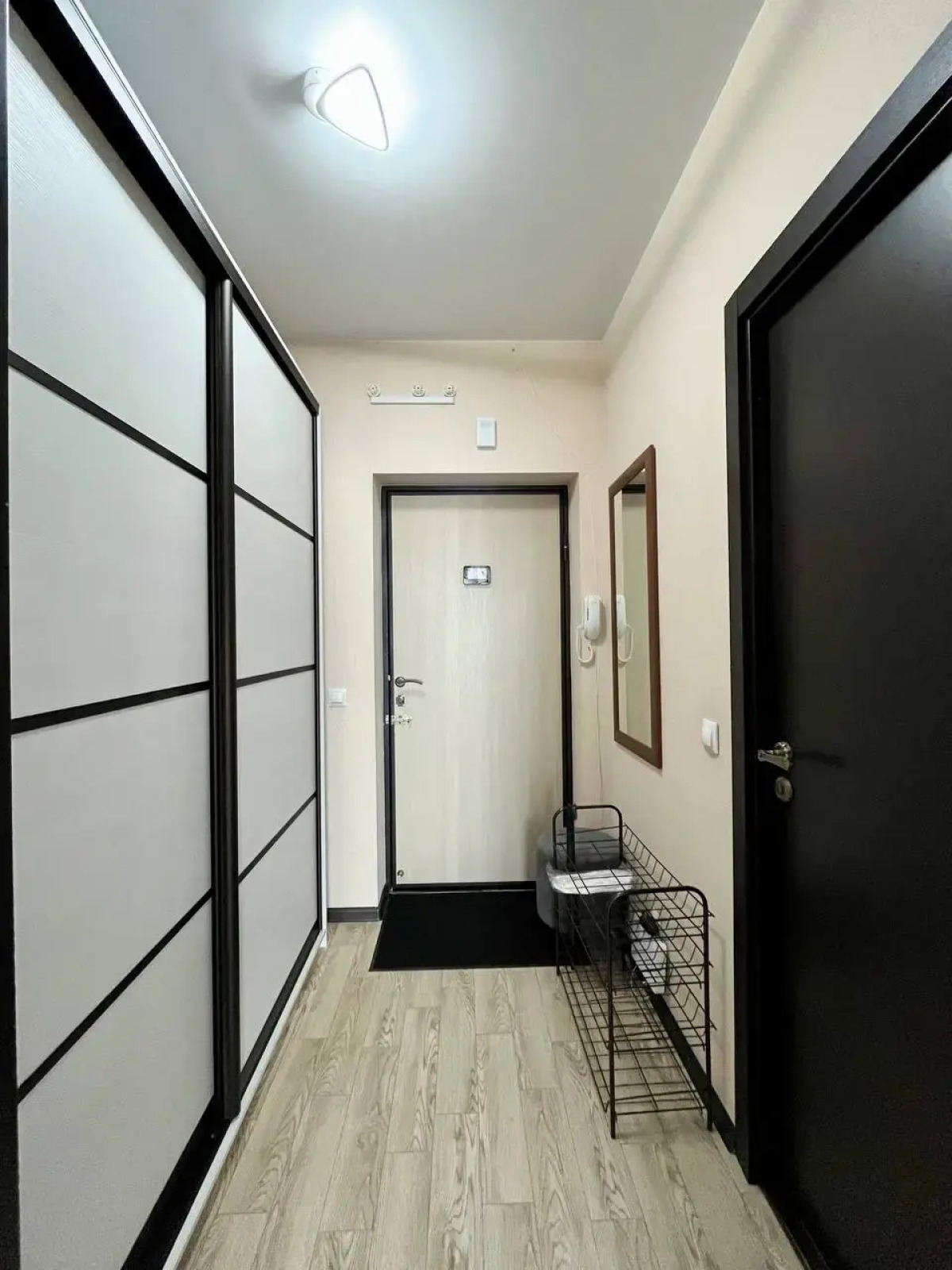 Квартира Уютная студия в 5 минутах от ТРЦ Планета