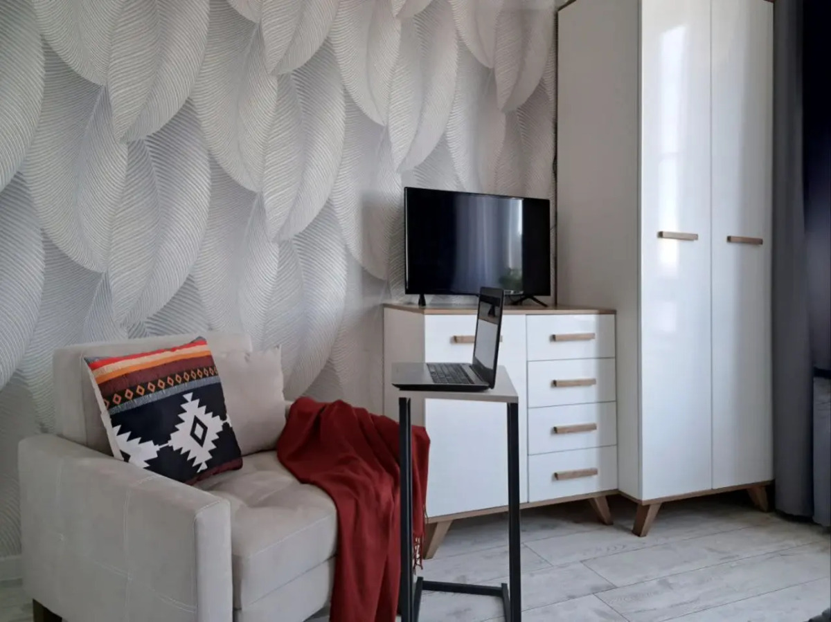 Апартаменты Wing Tower - высотная студия в центре