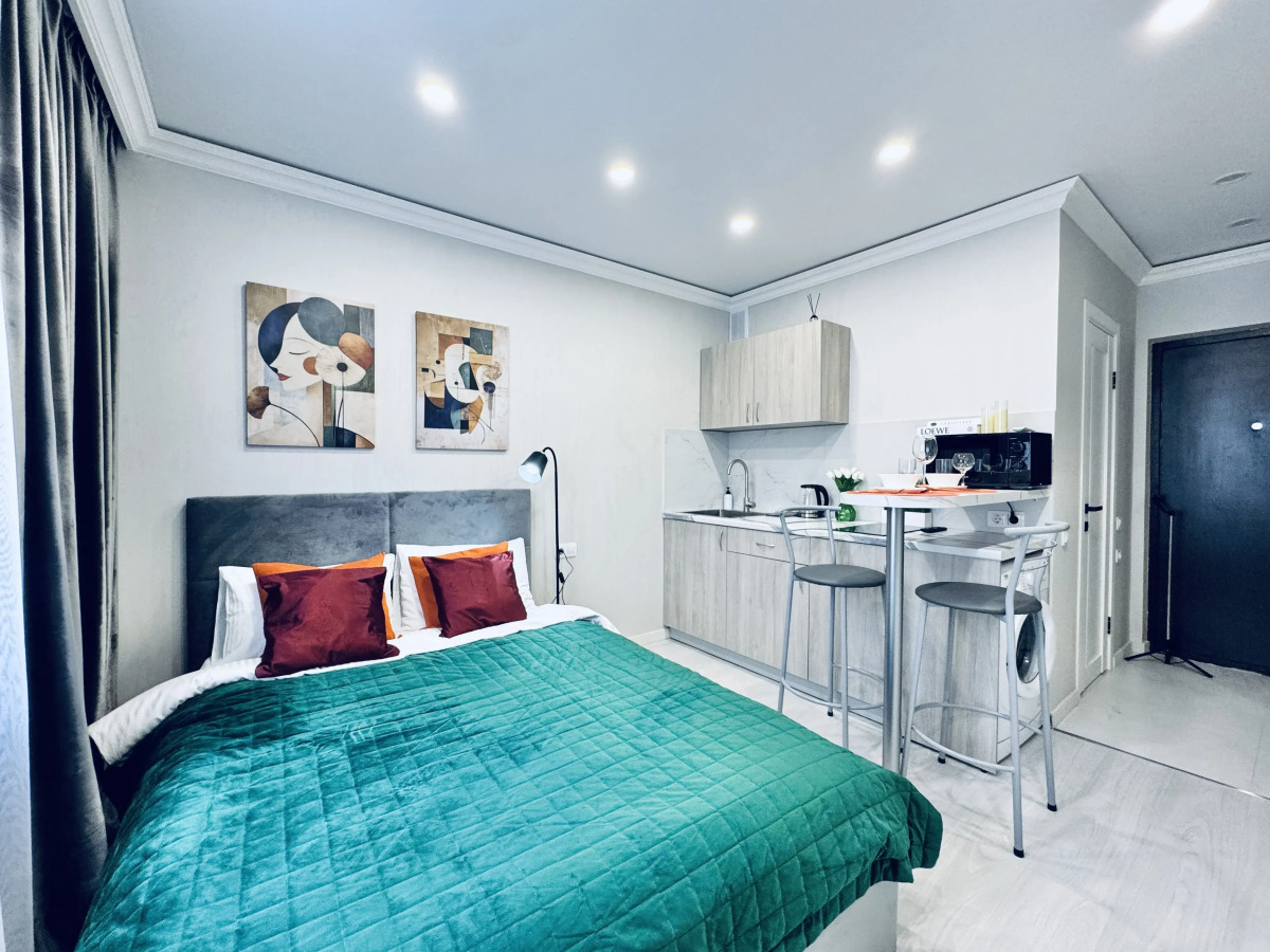 Апартаменты Уютная студия с дизайнерским ремонтом