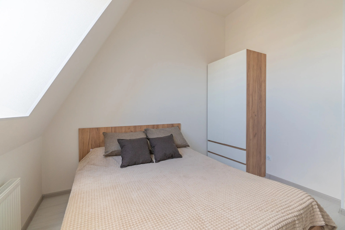 Апартаменты Двухкомнатная Квартира на Мансардном Этаже