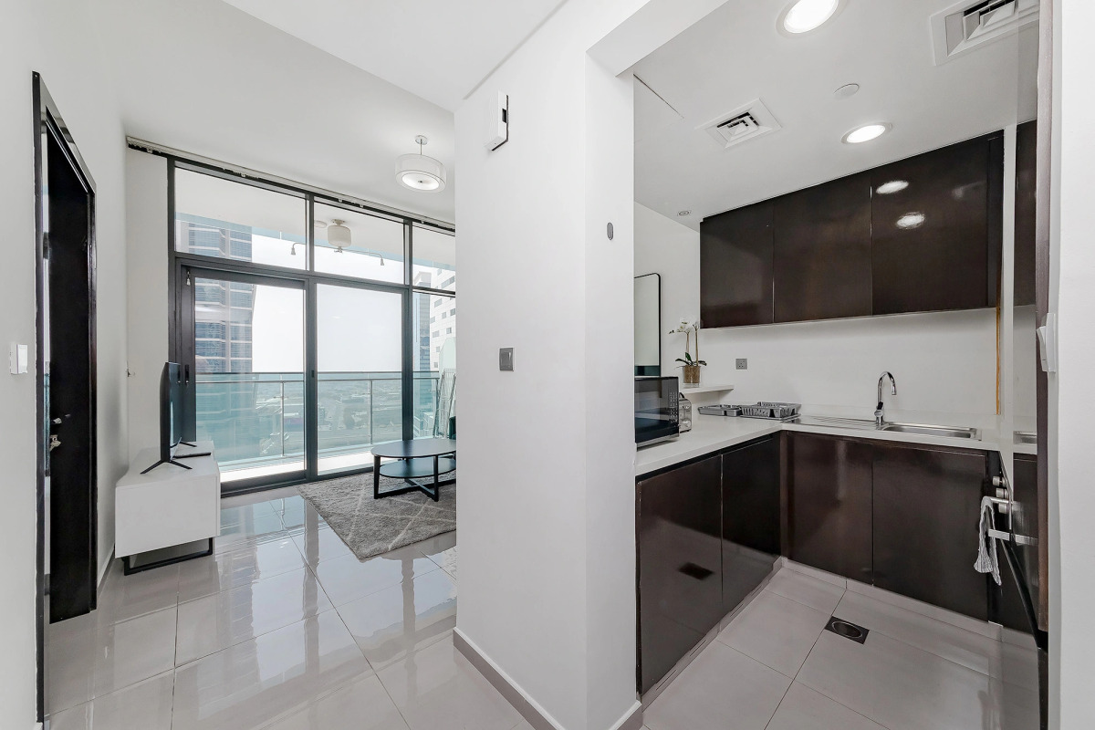 Апартаменты Stylish 1BR at Damac Merano Tower with Great View