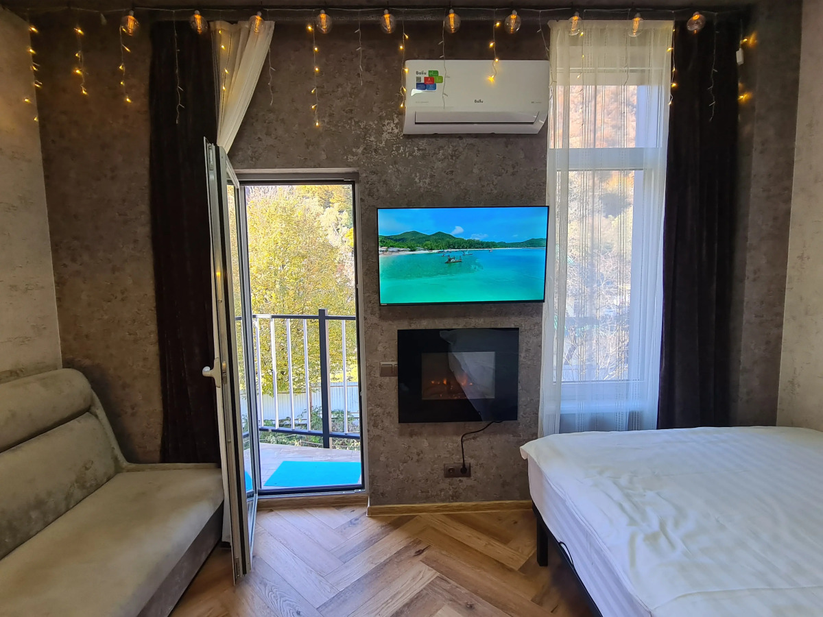 Апартаменты Квартира с Камином