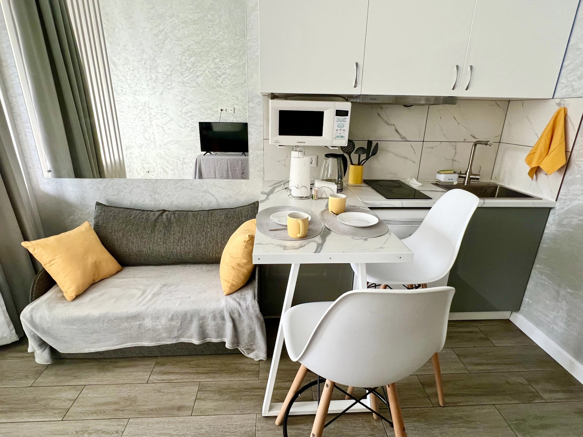 Квартира Светлая и уютная студия в центре города