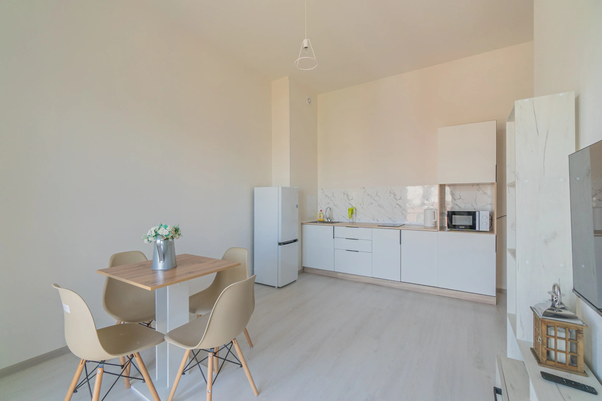 Апартаменты Двухкомнатная Квартира на Мансардном Этаже