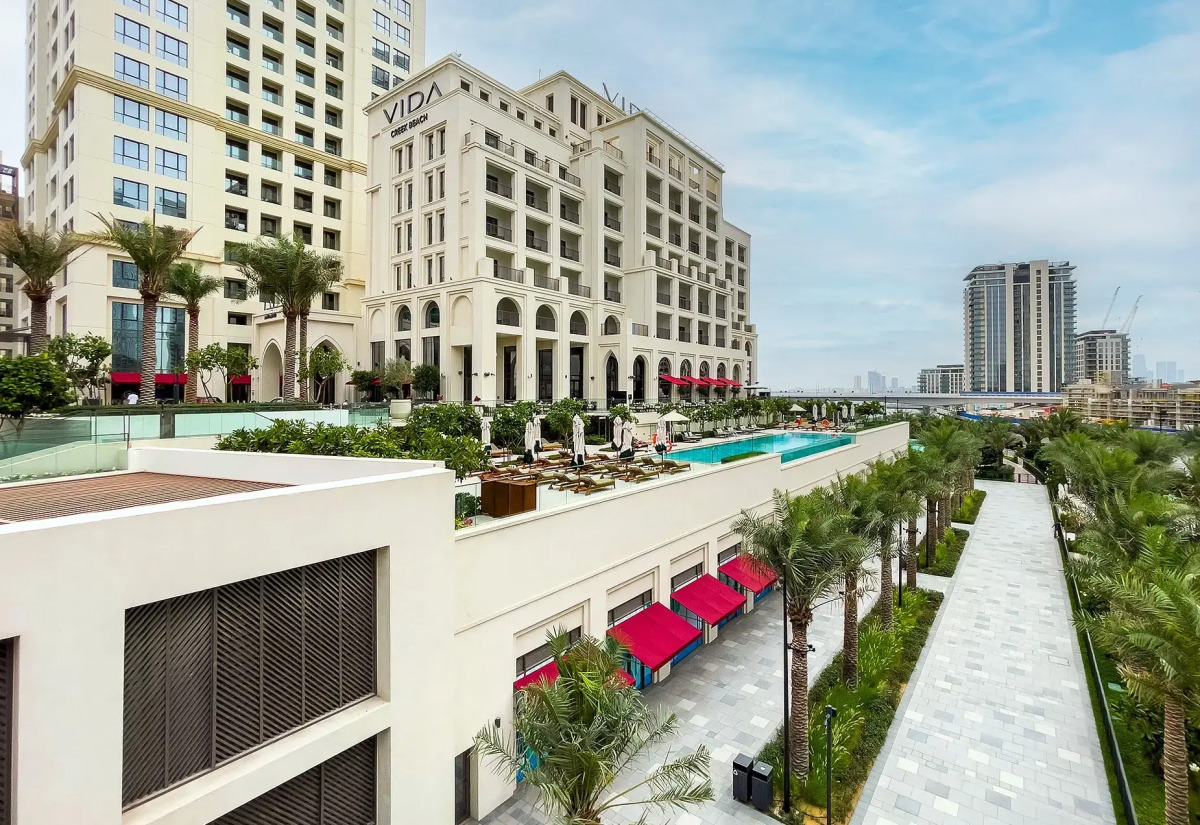 Апартаменты Сozy 1BR at Vida Residences Creek Beach