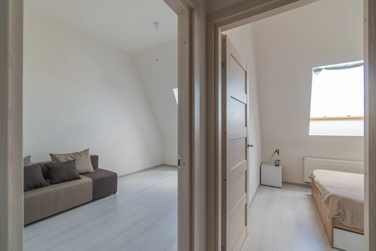 Апартаменты Двухкомнатная Квартира на Мансардном Этаже