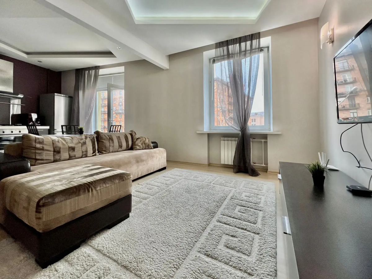 Апартаменты Уютная двухкомнатная квартира рядом с ЦУМом