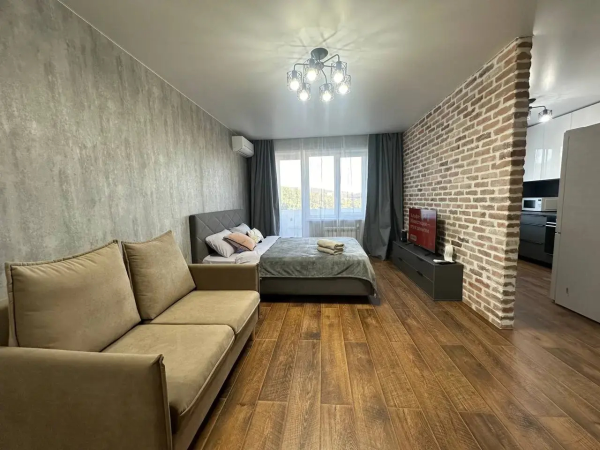 Апартаменты Уютная студия в экологичном районе города