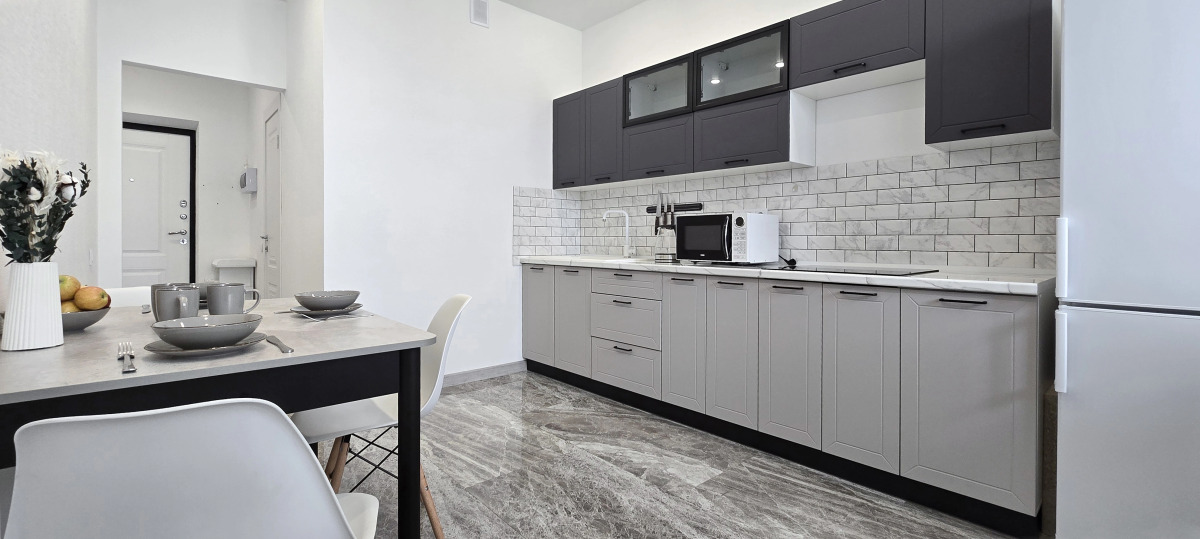 Квартира с большим телевизором и шикарным видом на реку Кубань