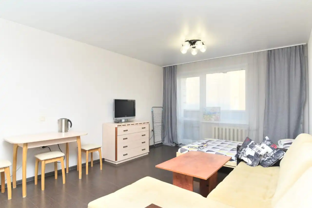 Апартаменты Уютная студия на Зорге 94