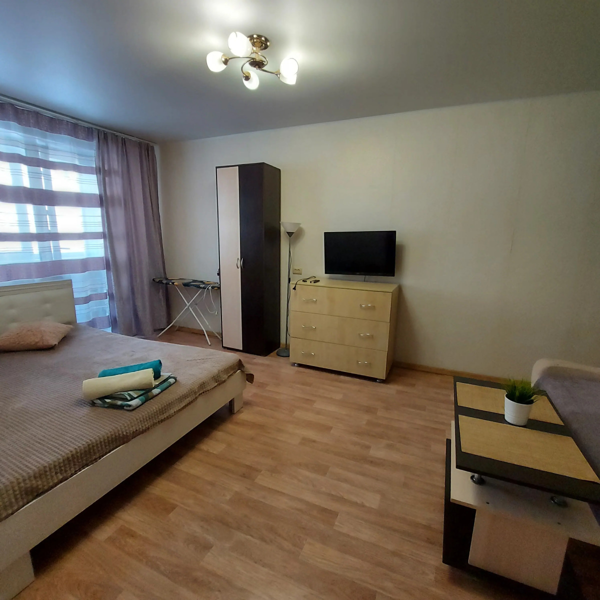 Апартаменты Уютная Квартира на Ново Вокзальной