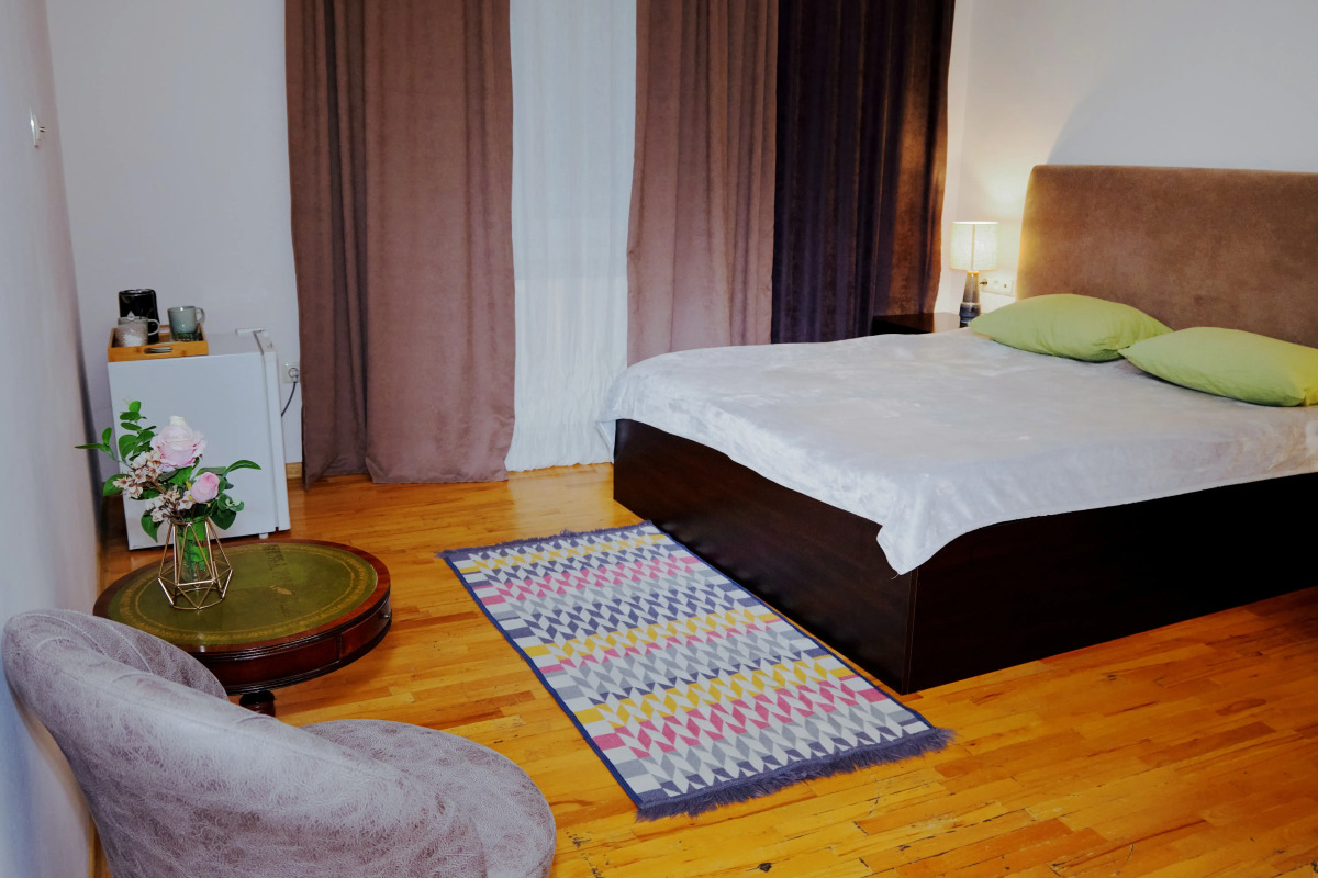 Отель Triple Eight