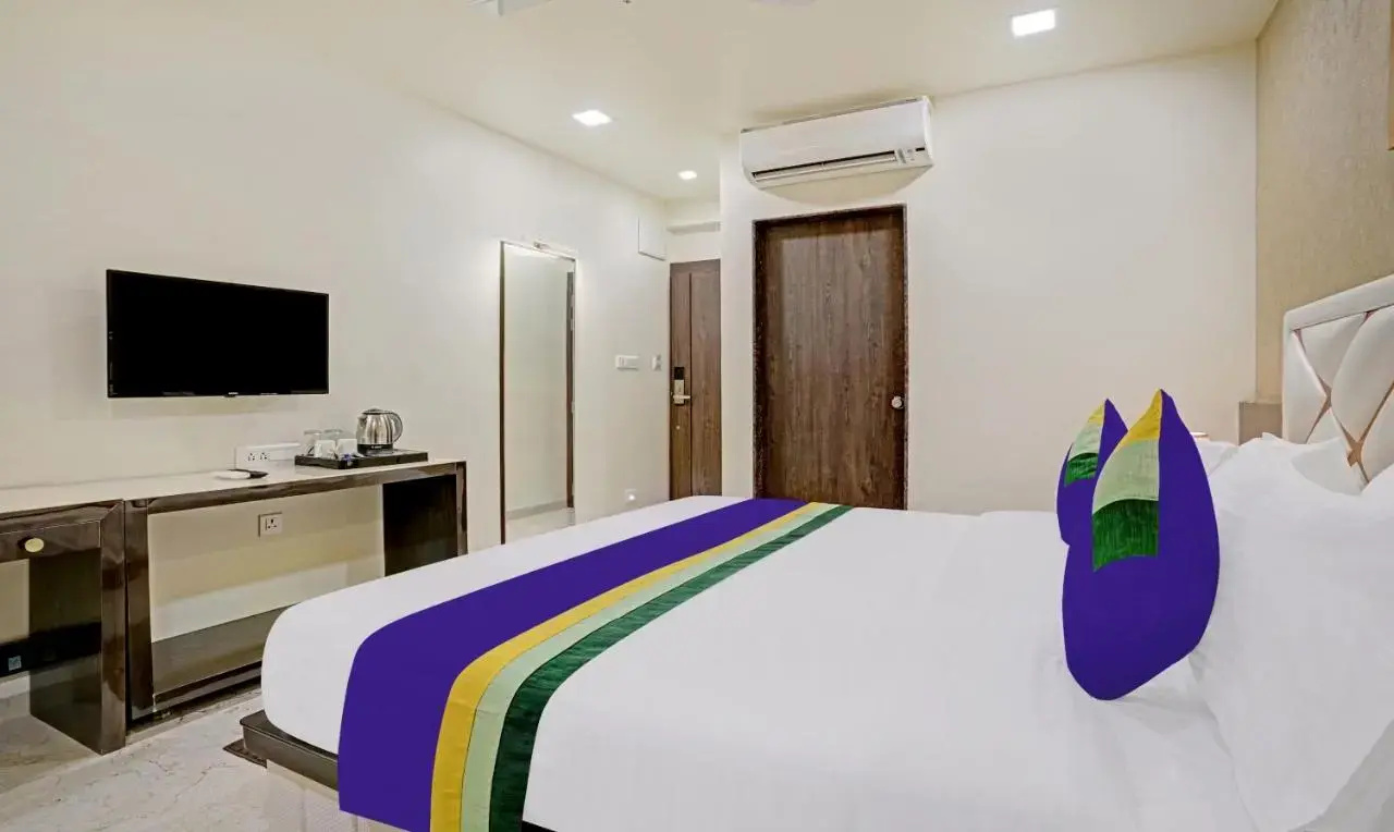 Photo - Treebo Premium Golden Bliss Trimurti Nagar Square