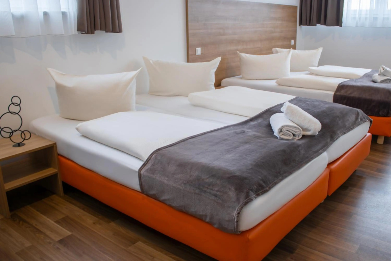 Foto - Orange Hotel und Apartments