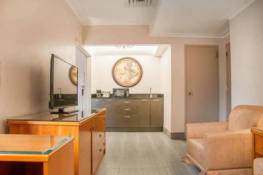 Foto - Empire Suites
