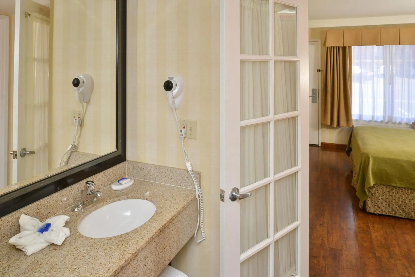 Photo - Best Western Plus Raffles Inn & Suites