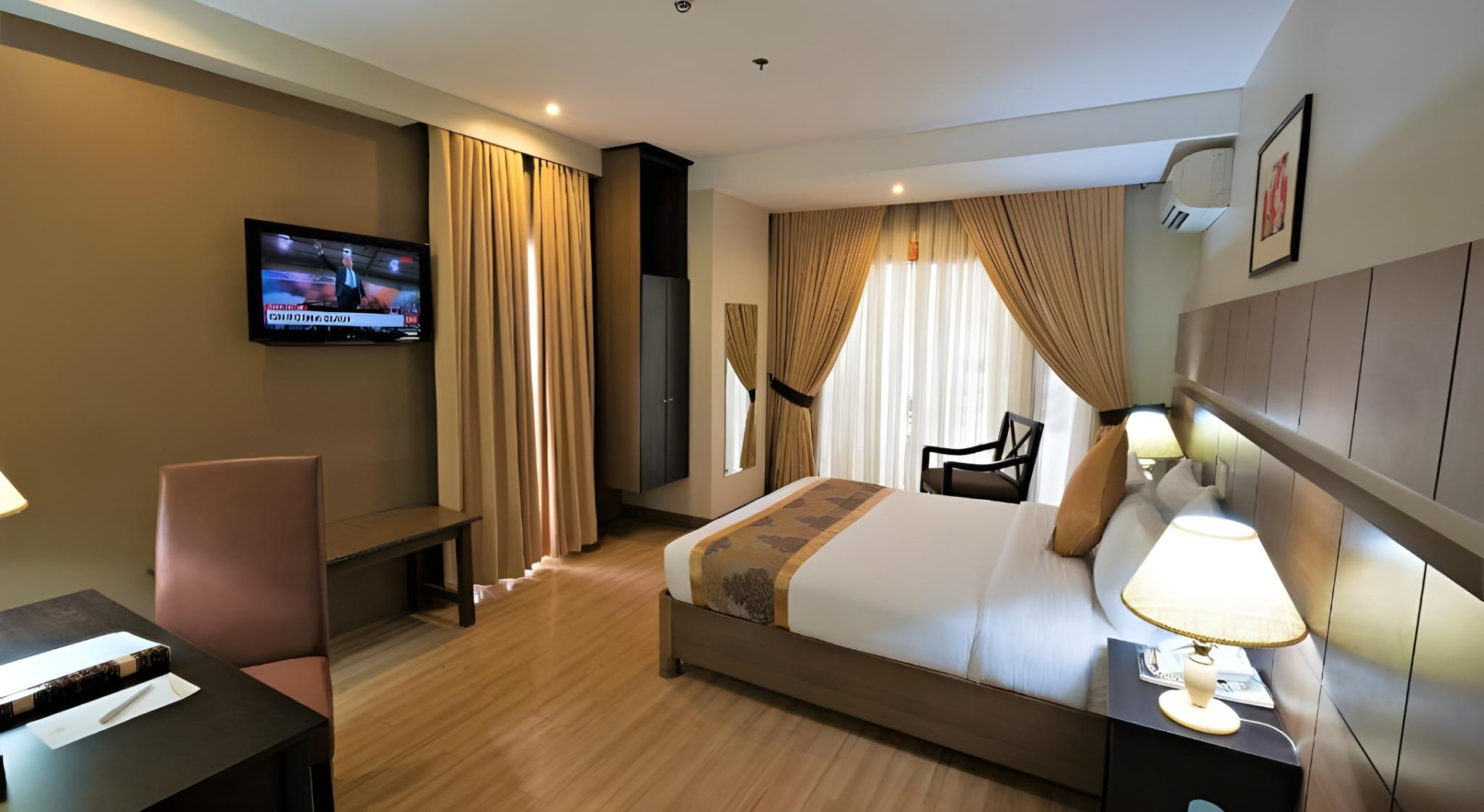 Foto - The Pinnacle Hotel and Suites