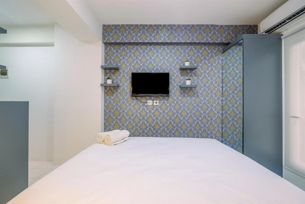 Comfy and Homey Studio at Podomoro Golf View Apartment