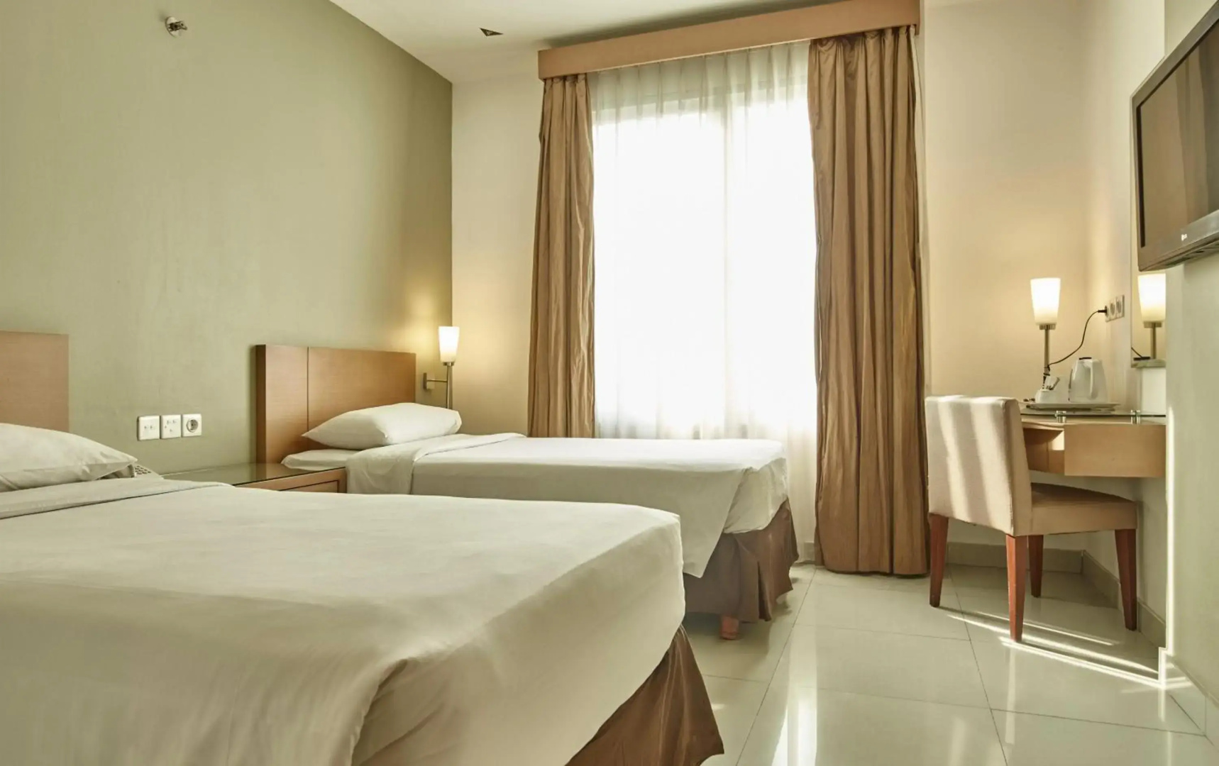 Foto - Triniti Hotel Gajah Mada