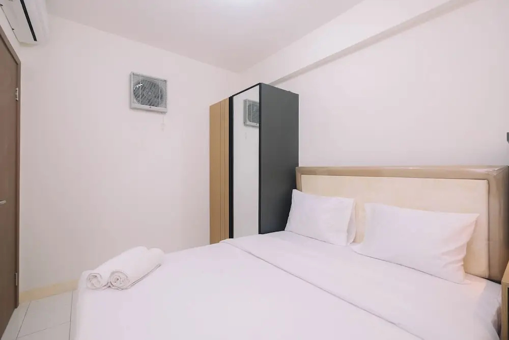 Simple and Cozy Living 2BR at Podomoro Golf View Apartment