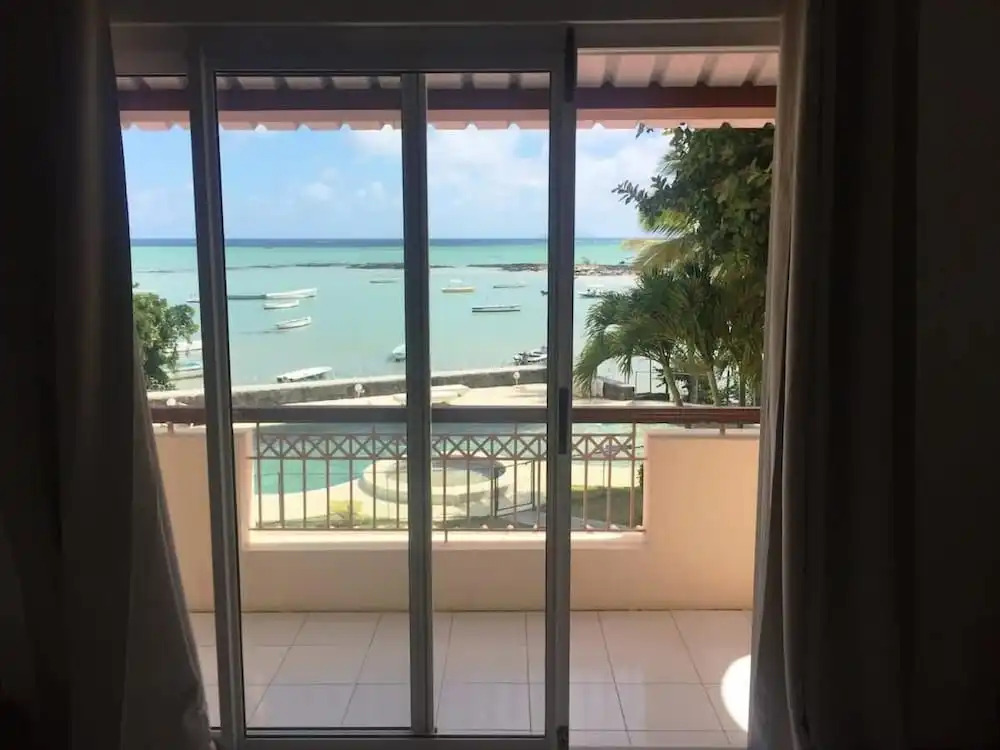 Foto - Résidence Les Banians - Complexe privé en bord de mer avec piscine