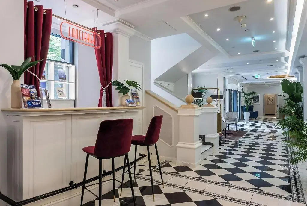 Foto - Queen's Court Hotel & Residence