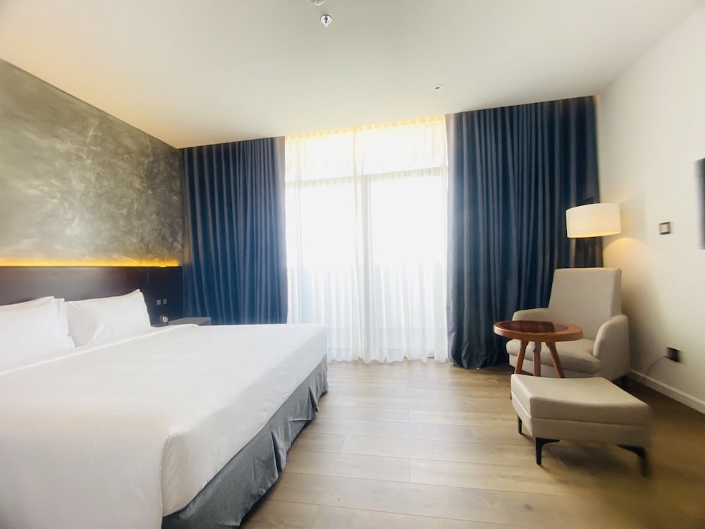 Newcc Hotel & Serviced Apartment