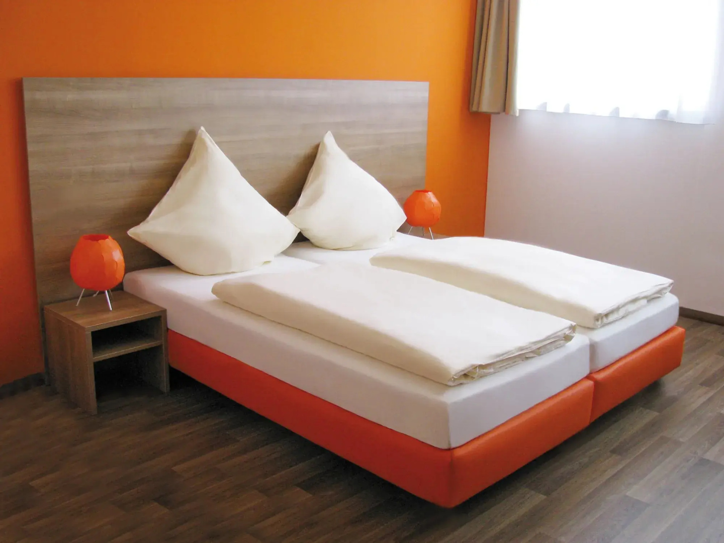 Foto - Orange Hotel und Apartments