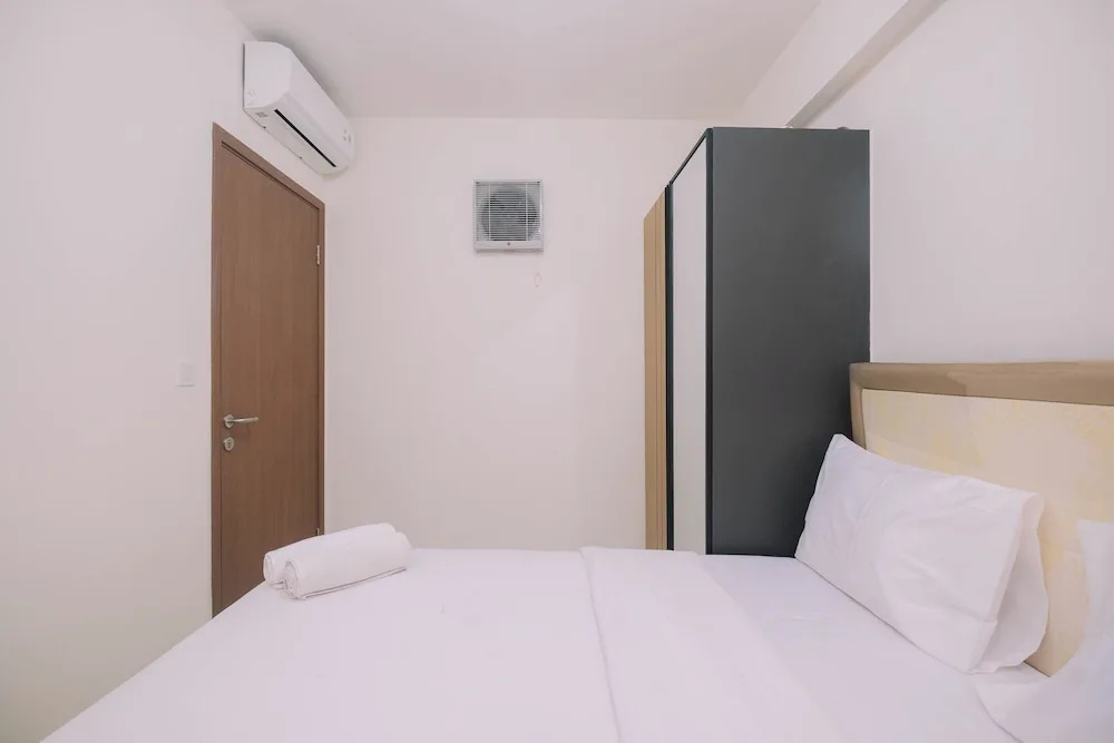 Simple and Cozy Living 2BR at Podomoro Golf View Apartment