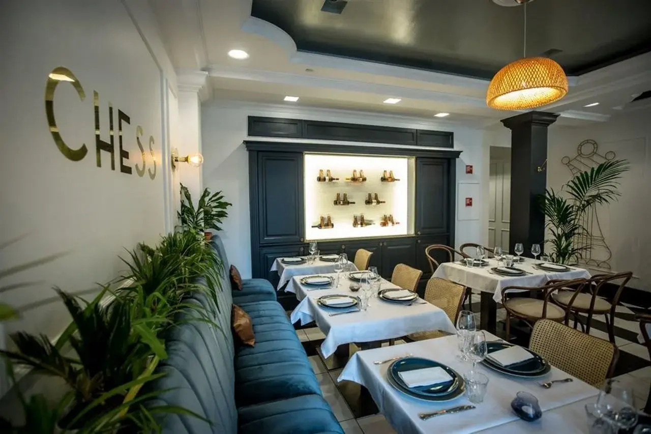 Foto - Queen's Court Hotel & Residence