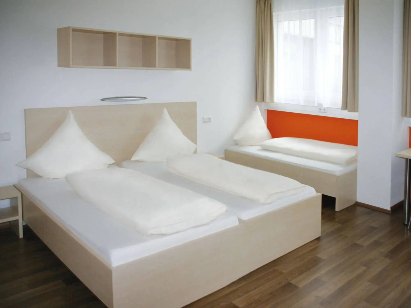 Foto - Orange Hotel und Apartments