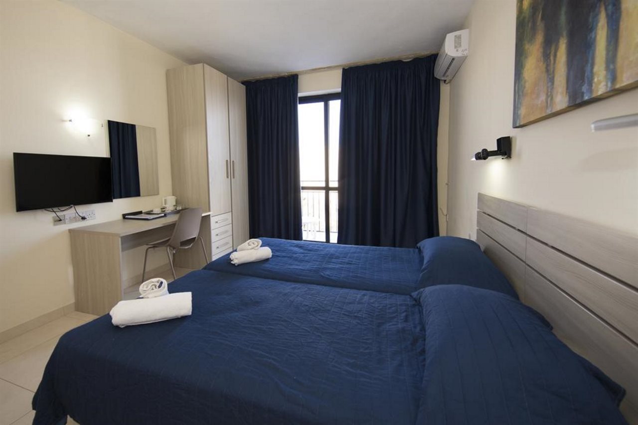 Foto - Relax Inn Hotel