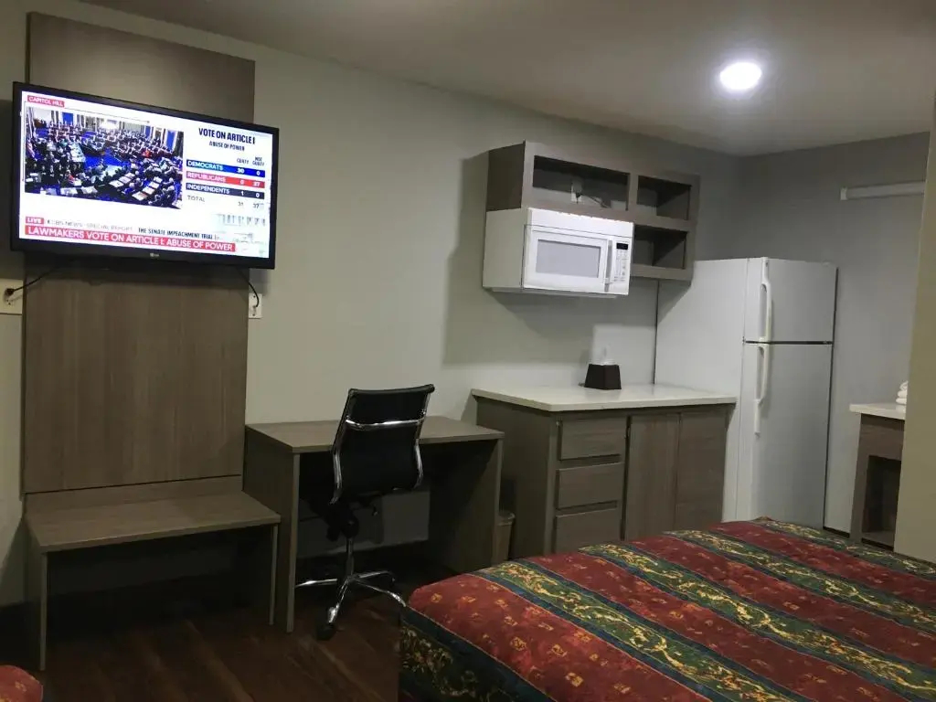 Foto - Travel Inn & Suites
