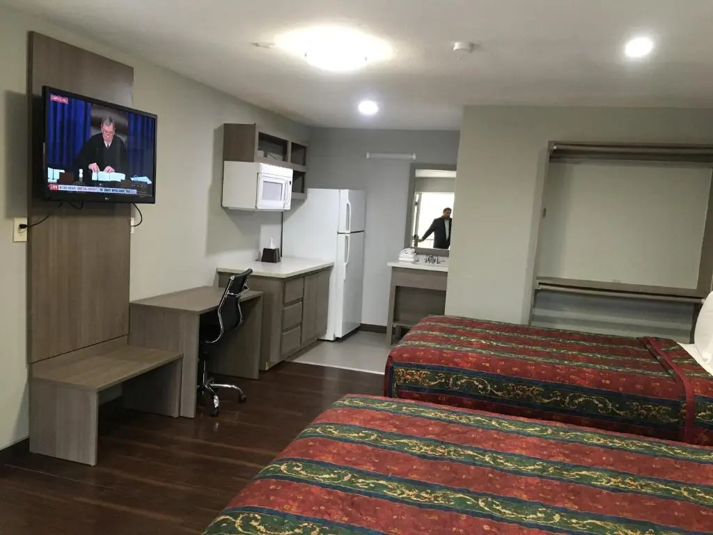 Foto - Travel Inn & Suites